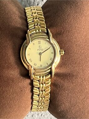 FENDI 300L gold plated black dial ladies watch